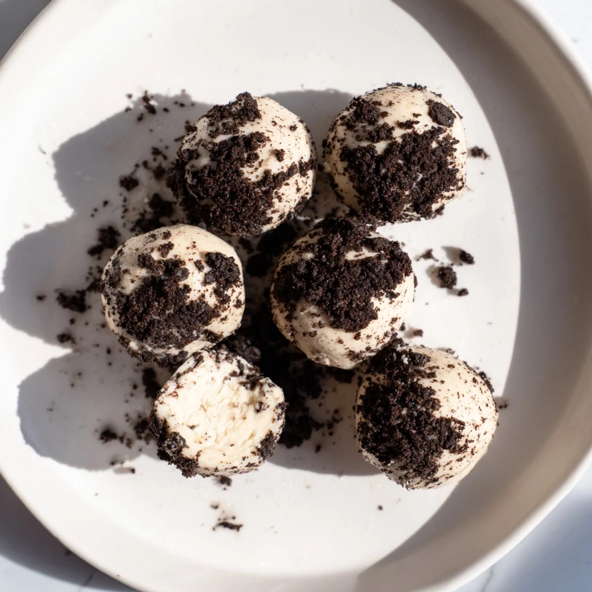 Perfect homemade Cream Cheese Oreo Protein Balls, ready to be enjoyed as a post-workout snack or treat.