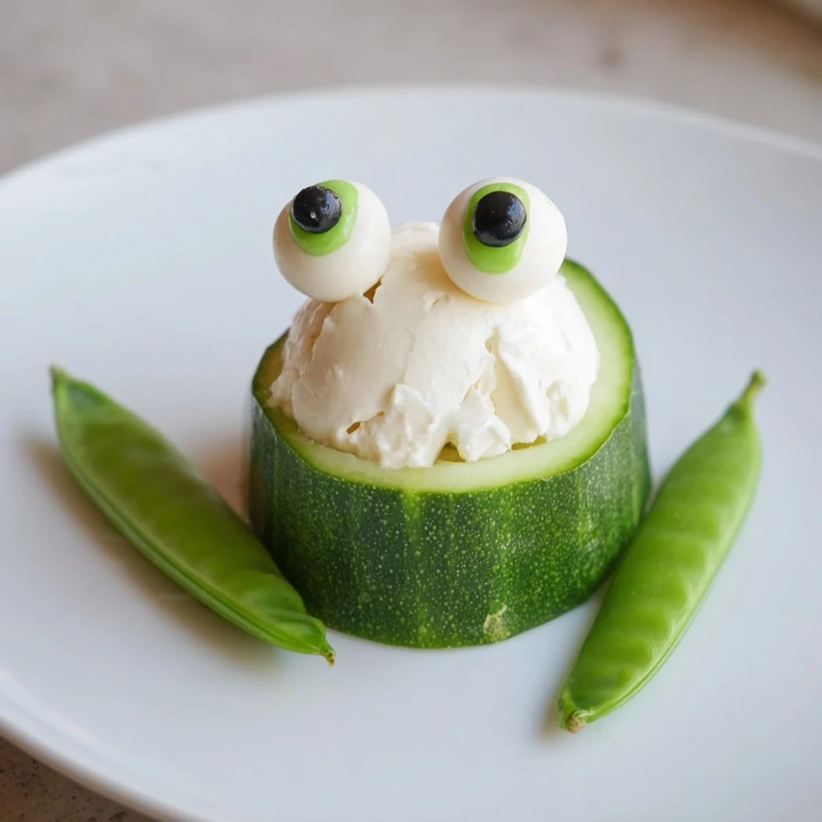 Easy Frog Pond Snack Tray recipe, showing fun, kid-friendly snack food and healthy ingredients.