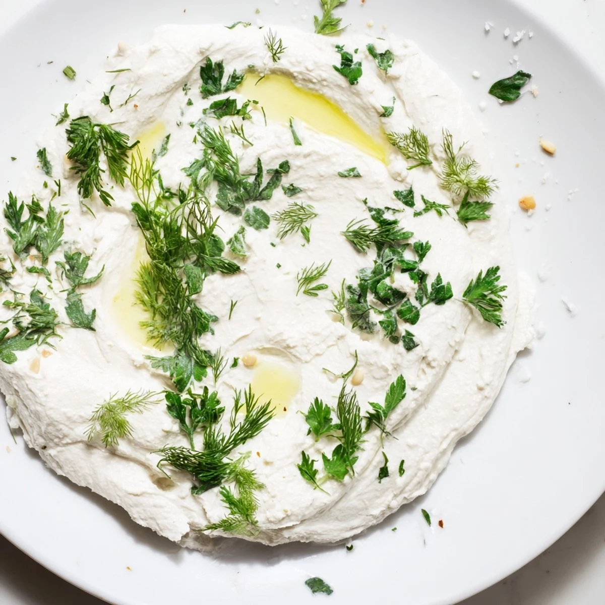 See the "Fossil Record," a unique appetizer: soft cheese impressions with herbs and a nut border.