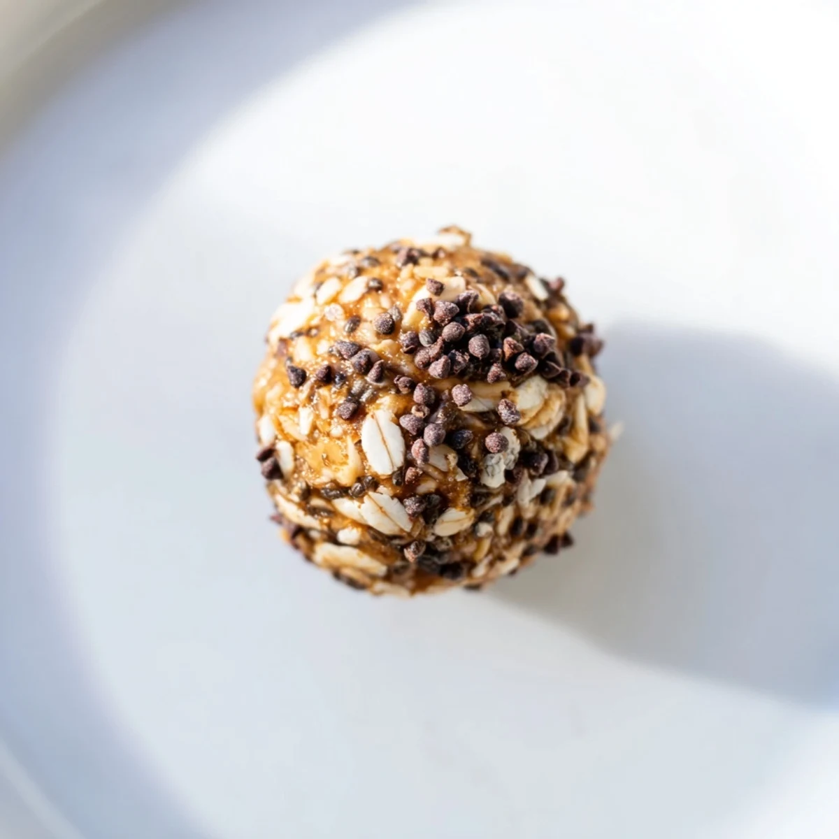 These raw Almond-Chia Energy Bites are delightfully sticky, offering a satisfying grab-and-go treat.