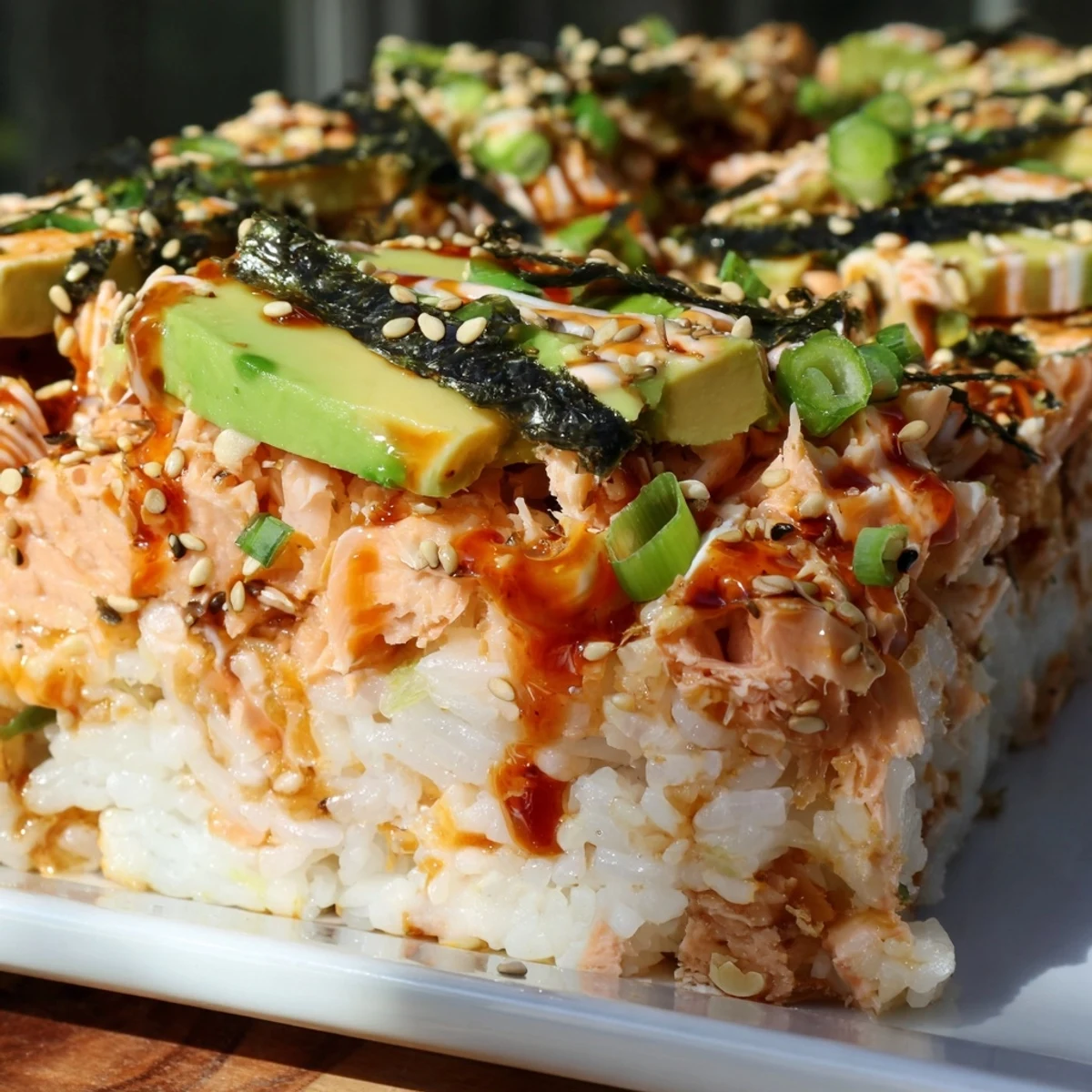 Warm and flavorful, a baked Sushi Bake Casserole with flaked salmon and creamy avocado awaits.