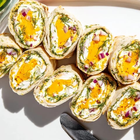 Delightful pickle-in-a-blanket appetizer served cold, perfect for parties and gatherings.  