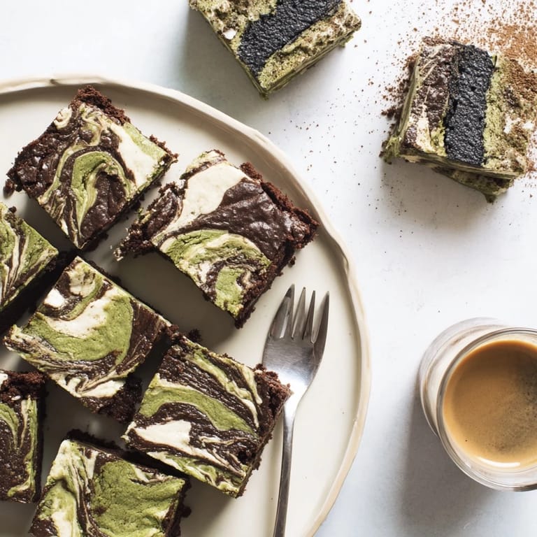 Creamy black sesame cheesecake bars offer a rich twist on traditional cheesecake treats.