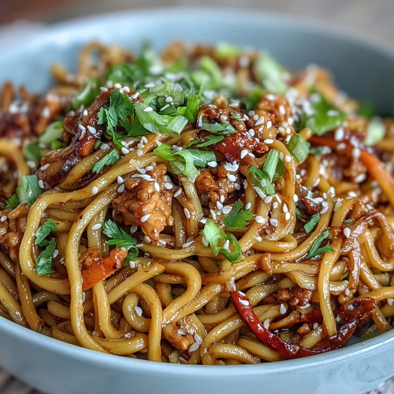Wok-seared Korean Turkey Fried Noodles featuring bouncy noodles, savory ground turkey, and crisp vegetables, perfect for a quick weeknight dinner.